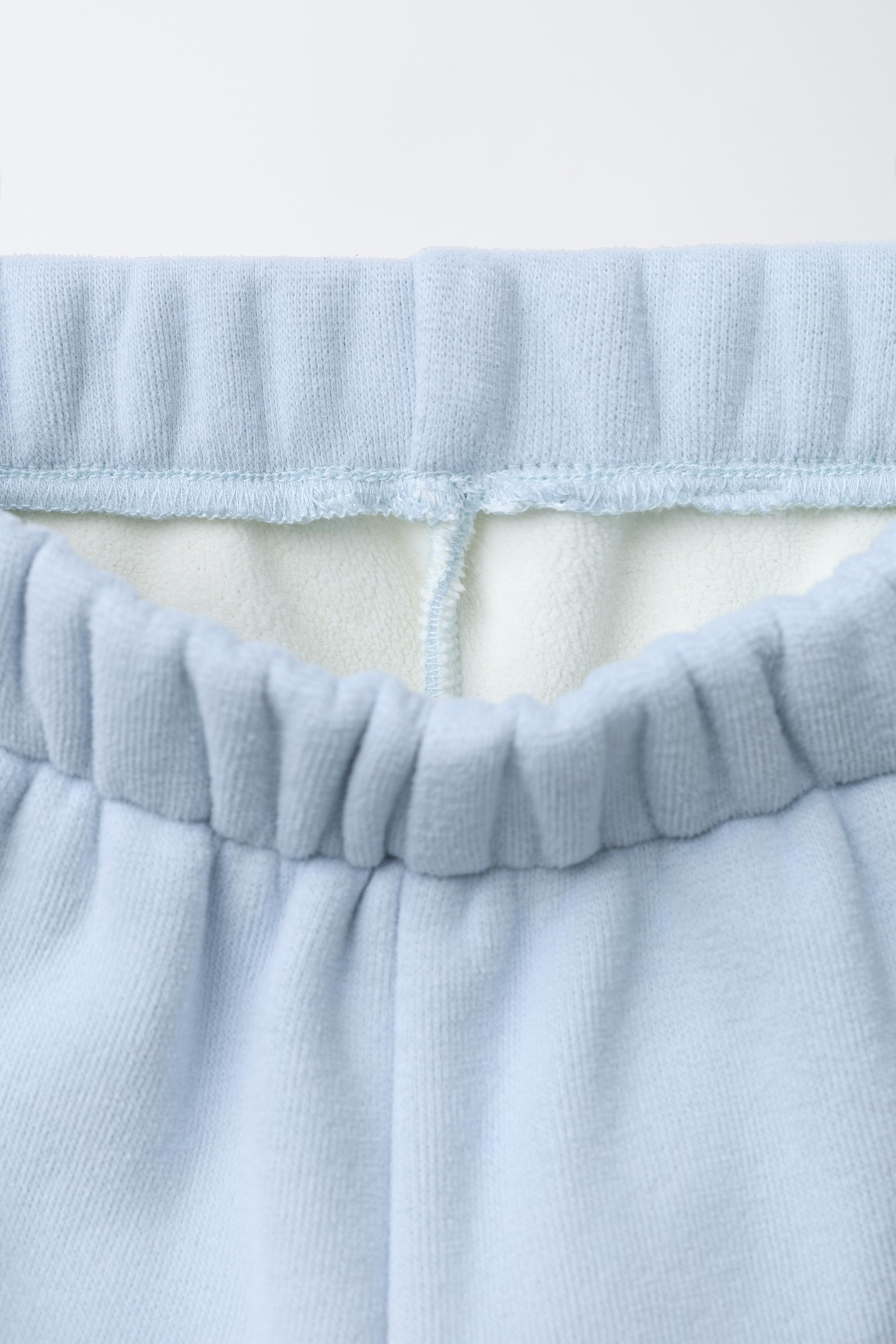 PANTALON BAGGY AVEC DOUBLURE POLAIRE ET LOGO